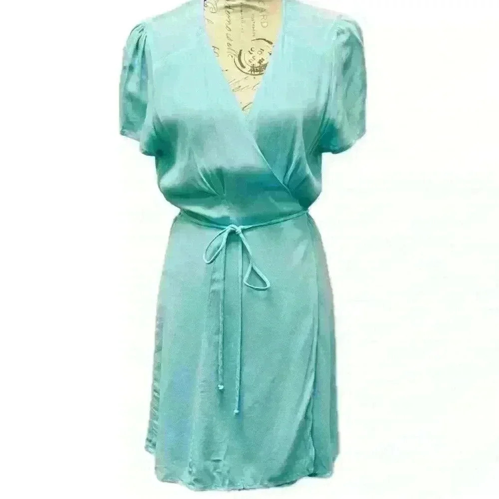 NWT Olivaceous Aqua Midi Wrap Dress
Size Small